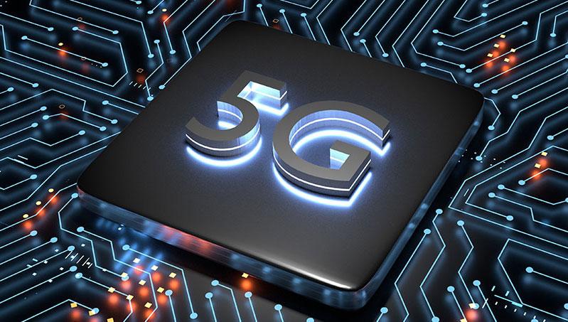 A 3D illustration of a 5G chip on a glowing circuit board, representing advanced connectivity.