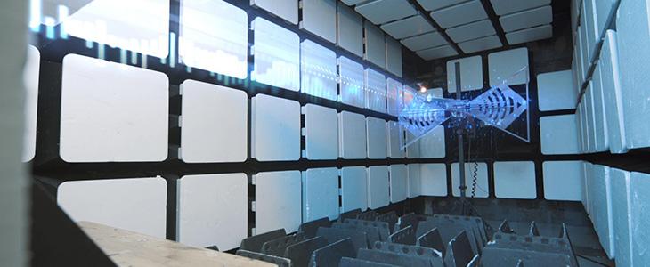 Anechoic chamber with a testing antenna setup, used for measuring radio and antenna performance.